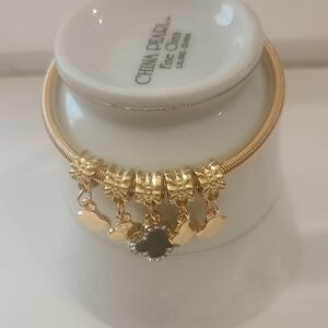 Goldtone Charm Bracelet with Black Clover Centerpiece